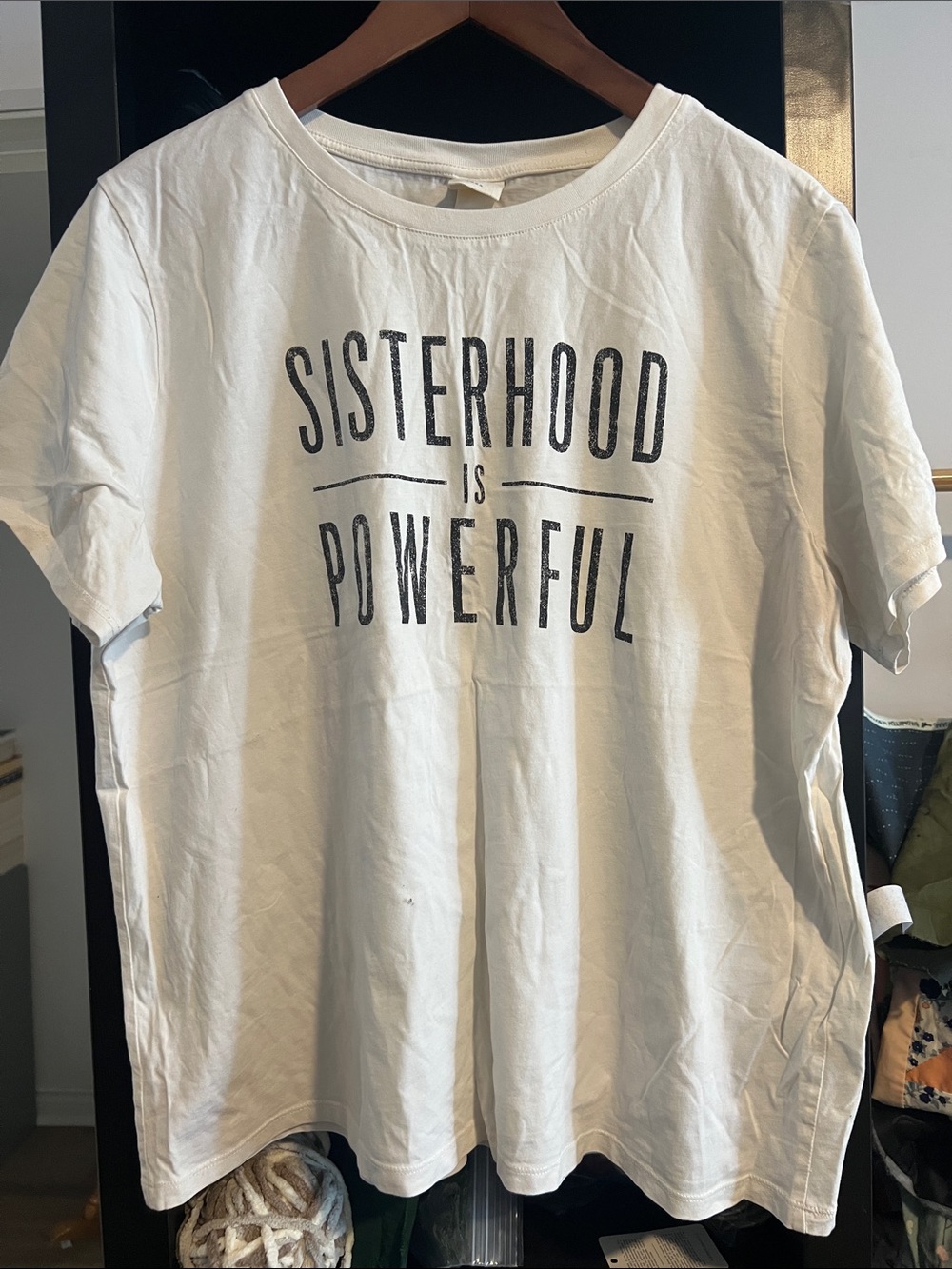 H&M White Tee with Black 'Sisterhood is Powerful' Graphic